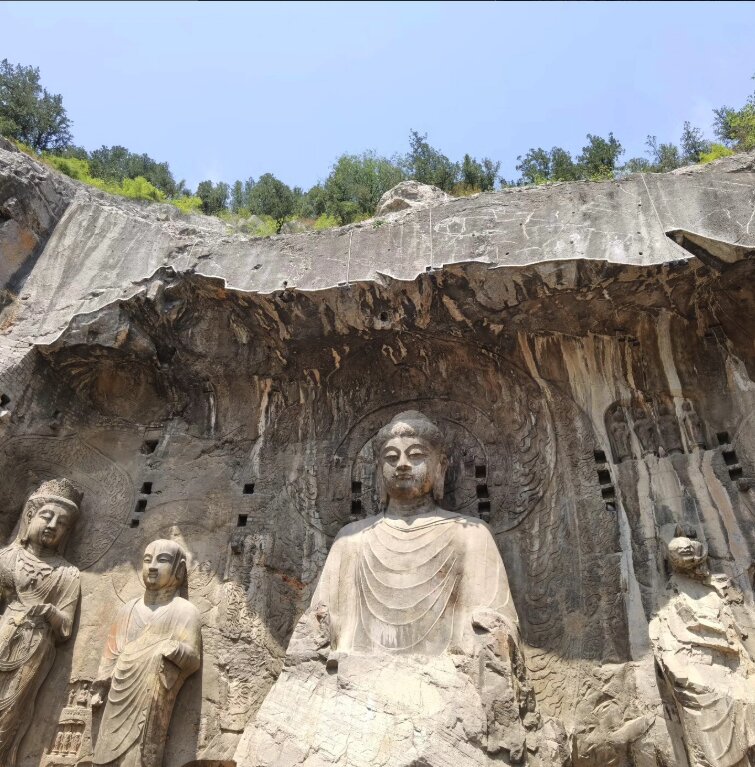 Buddha statues carved into the cliffs at the Longmen Grottoes near Luoyang